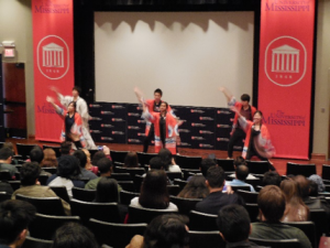 students dancing on a stage