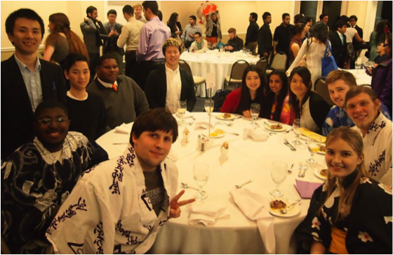 Students at a dining table at the International Gala